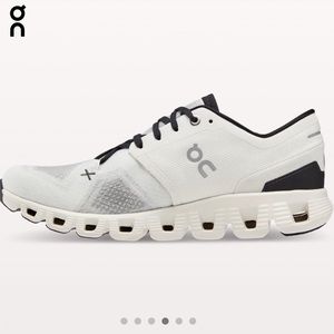 On Clouds Style: Cloud X 3. Women size 8 Color:Black/White